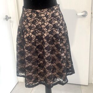 Vertigo Paris, black LACE Bell skirt, fully lined with large pleats size X Small